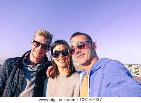 Three Youg Friends Taking Selfie On Sunny Autumn Day - Fashion  And Hipsterstyle Concept - Warm Ligh