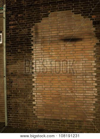 Immured door reconstructed in a brickwork wall