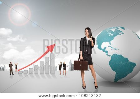 Buisnesspeople with growth graph and earth