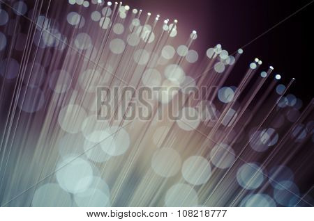 Fiber optic cables, fibre connection, telecomunications concept.