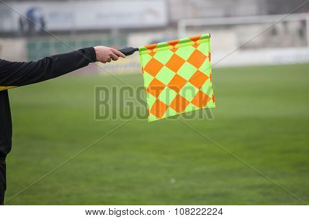 Soccer Referee Hold The Flag. Offside Trap