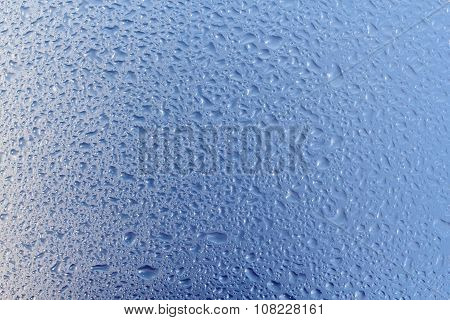 Background of raindrops on glass.