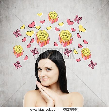 A Brunette Beautiful Woman Is Dreaming About The Gift. Gift And Heart Icons Are Drawn On The Concret