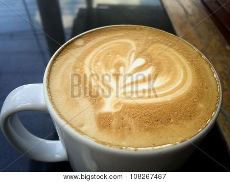 Full Cup of Coffee on the Table