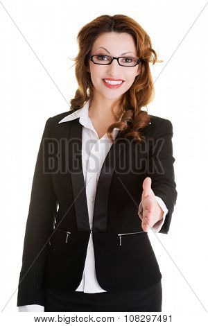 Happy successful businesswoman rady to hand shake.