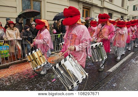 People take part in parade at Basel Carnival in Basel, Switzerland.