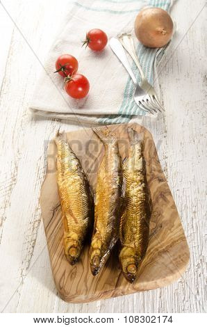 Smoked Vendace On Wooden Board