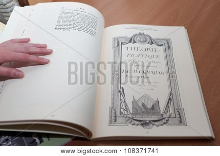 ST. PETERSBURG, RUSSIA - NOVEMBER 14, 2015: Ancient musical reprint book demonstrated at the department of organ, harpsichord, and carillon of SPbSU during the meeting Bell and Carillon Art in Russia