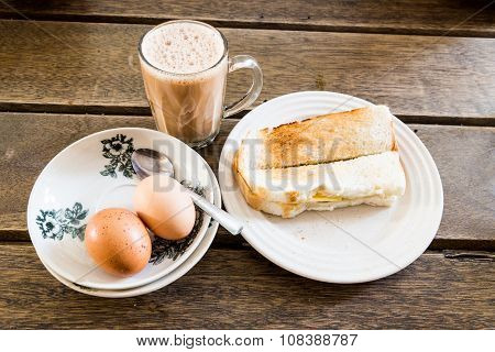 Popular Malaysian Breakfast Teh Tarik, Toast Bread And Half-boiled Egg