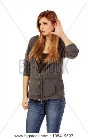 Teenage woman overhears the conversation.