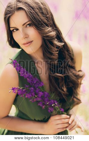 Beautiful young woman with flower in spring garden
** Note: Soft Focus at 100%, best at smaller sizes