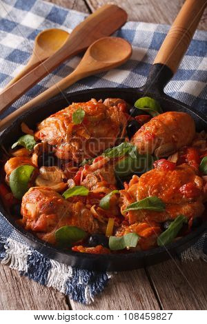 Italian Cuisine: Chicken Cacciatori Close Up In A Pan. Vertical