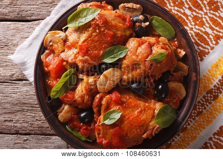 Homemade Cacciatori Chicken On A Plate Close-up. Horizontal Top View