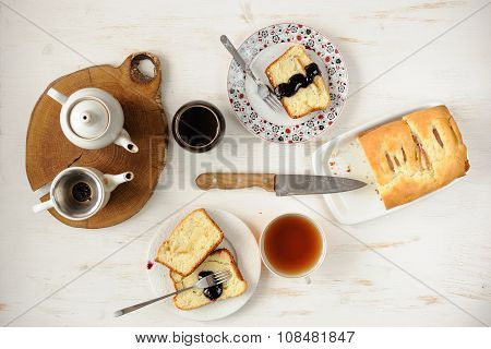 Teaware With Homemade Cake On White Table Topview