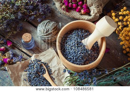 Healing Herbs, Wooden Mortar With Lavender, Bottles Of Tincture, Herbal Medicine. Top View.