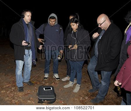 Ron Yacovetti Checks His Audio Device During Paranormal Investigation