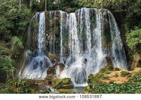 Waterfall In A Lush Rainforest. Beautiful Waterfalls Or Cascades In El Nicho  In Scambray Mountains.