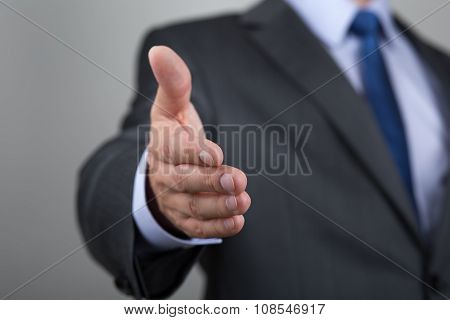 Businessman Offering His Hand For Handshake