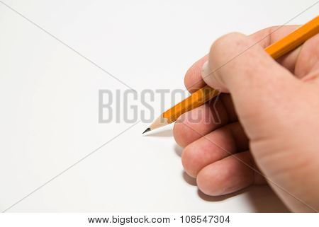 Men's Right Hand Holding A Pencil On Over White