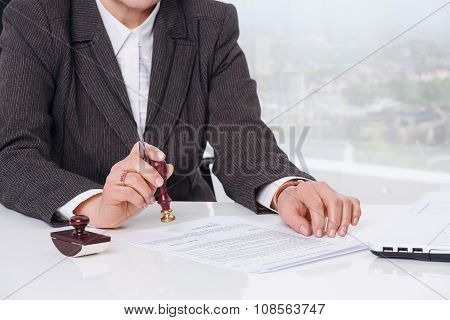 Signing document at office