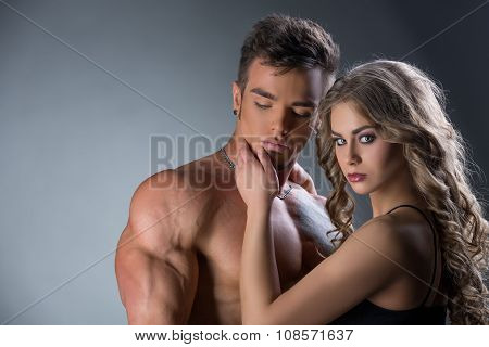 Portrait of sexy hunk and girl with beautiful eyes