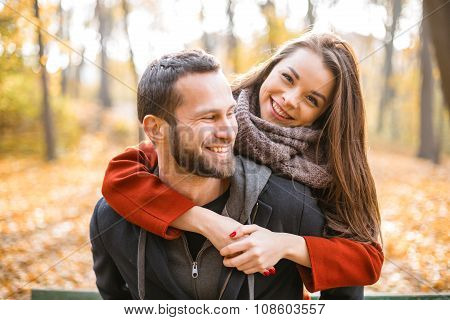 Nice concept for young couple in autumn park
