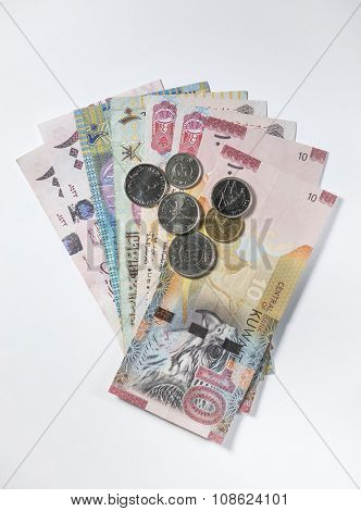 Assorted currency notes and coins from Gulf countries. Stock image.