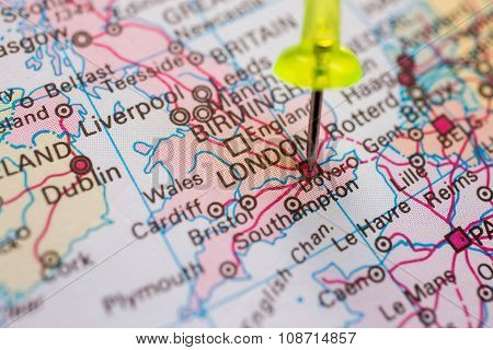 Push pin pointing at London