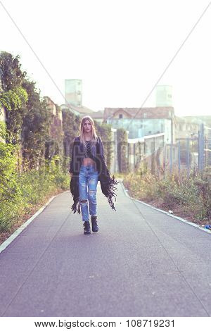 Girl Walks In The Area Of ??the Abandoned City