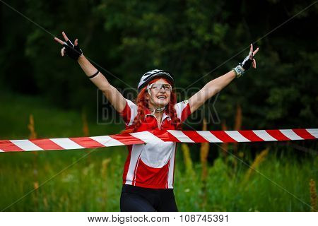 Young Woman Wins The Race Crossing Finish Line