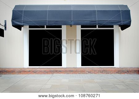 Shopfront Vintage Store Front With Canvas Awnings And Blank Display