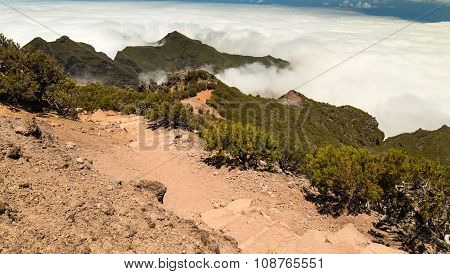 Stony Track In The Mountains Of Madeira Over Clouds