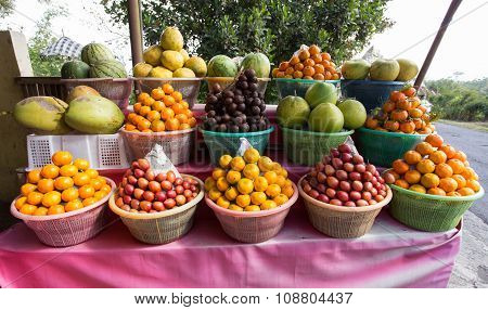 Tropical Fruits In Baskets On Fruit Market