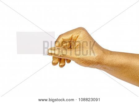 Golden hand holding an empty business card