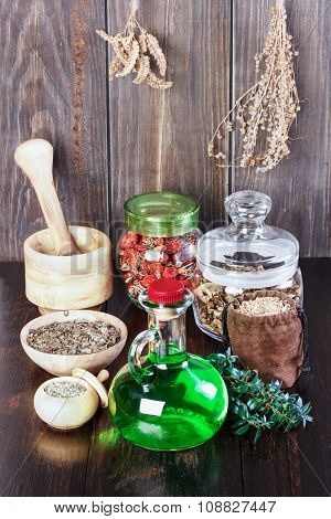 Therapeutic Herbal Tincture, Alternative Medicine, Love Potions, Dried Herbs On A Wooden Table.