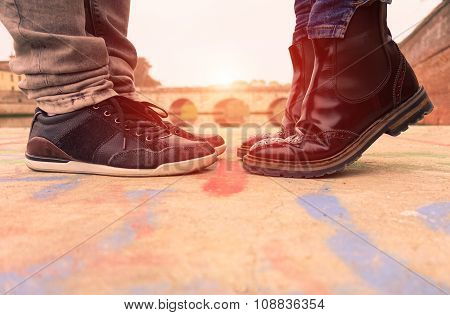 Young Couple Kissing Outdoors - Lovers On A Romantic Date At Sunset