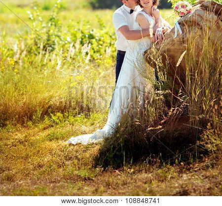 Bride and groom on their wedding day in garden
