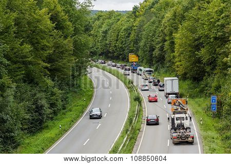 A light traffic jam with rows of cars. Traffic on the highw