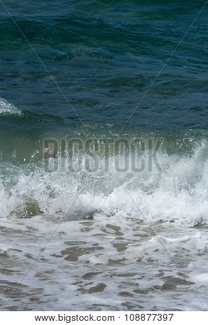 Transparent Deep Green / Blue Wave Of The Sea And That Breaks On The Shore With White Foam