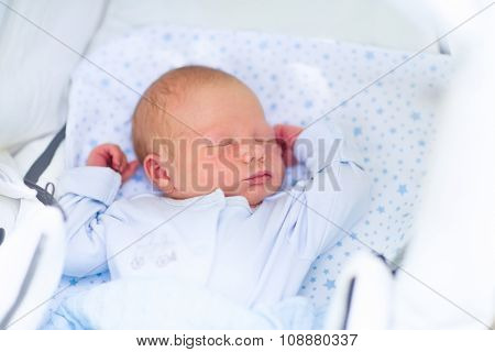 Newborn Baby Boy Sleeping In White Pram
