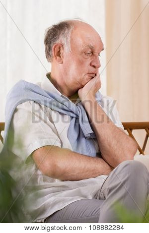 Thoughtful Elderly Man