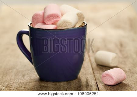 Sweet Colorful Marshmallow In A Cup On Wooden Background