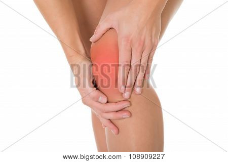 Cropped Image Of Woman Suffering From Knee Pain