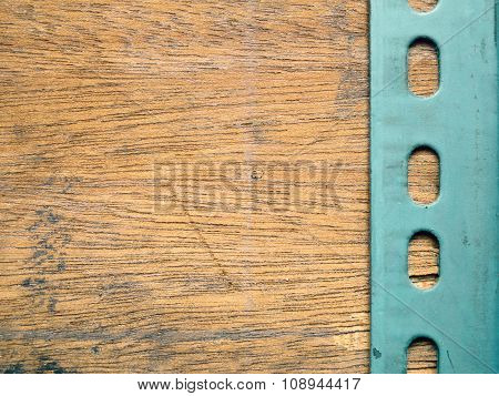 Metal Plate Over The Wooden Background