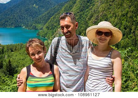 Happy tourists looking at camera