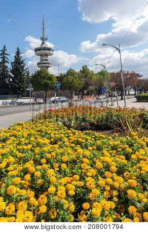 THESSALONIKI, GREECE - SEPTEMBER 30, 2017: OTE Tower and flowers in front in city of Thessaloniki, Central Macedonia, Greece