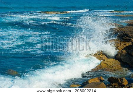 Huge ocean swell bringing in big waves in Bondi Beach Australia.