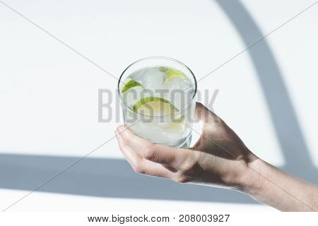 Person Holding Glass With Cocktail