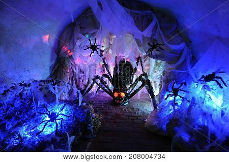 Spidery nest full of an artificial spiders