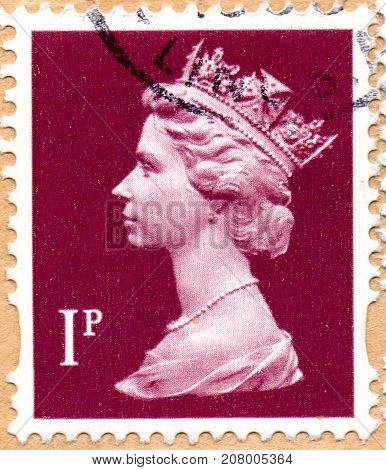 UKRAINE - CIRCA 2017: A postage stamp printed in England shows Portrait of Queen Elizabeth 2nd circa 1998